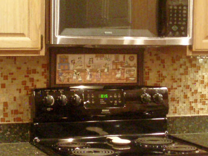 Baking Cookies Folk Art Style tile mural, installed above above highback stove, below microwave.
