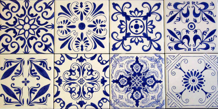 Erins Blue-White Decorative Accent Tiles. Eight field tiles, group 3, blue on white designs by Julia Sweda.