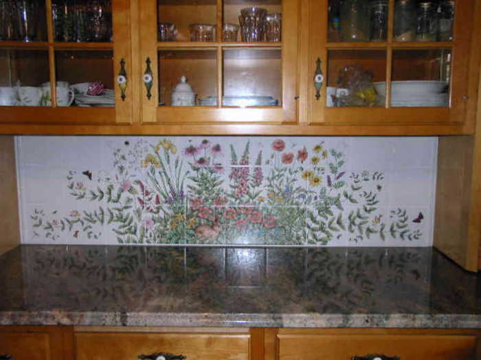 Robertas Flower Garden tile mural, installed into a hutch as a decorative backsplash.
