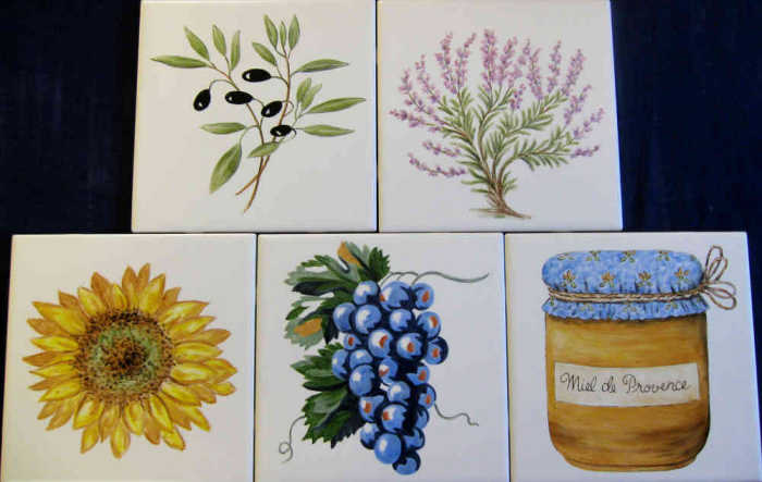 Chateauneuf-du-Pape accent tiles show olives, lavender, sunflower, grapes and local honey. Artist Julia Sweda.