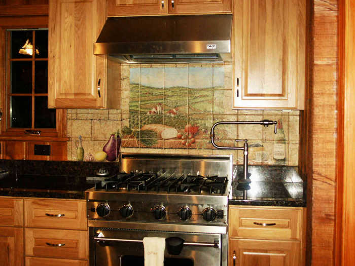 DiPace Kitchen Toscana Vista tile mural backsplash. Trompe l'oeil window view of vista, scenery. Artist Julia Sweda.