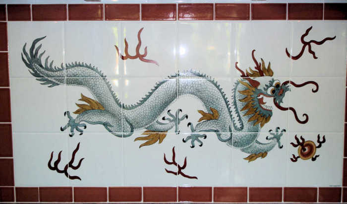 Druk Thunder Dragon and Bhutanese national symbol. Custom painted kitchen backsplash tile mural by Julia Sweda.